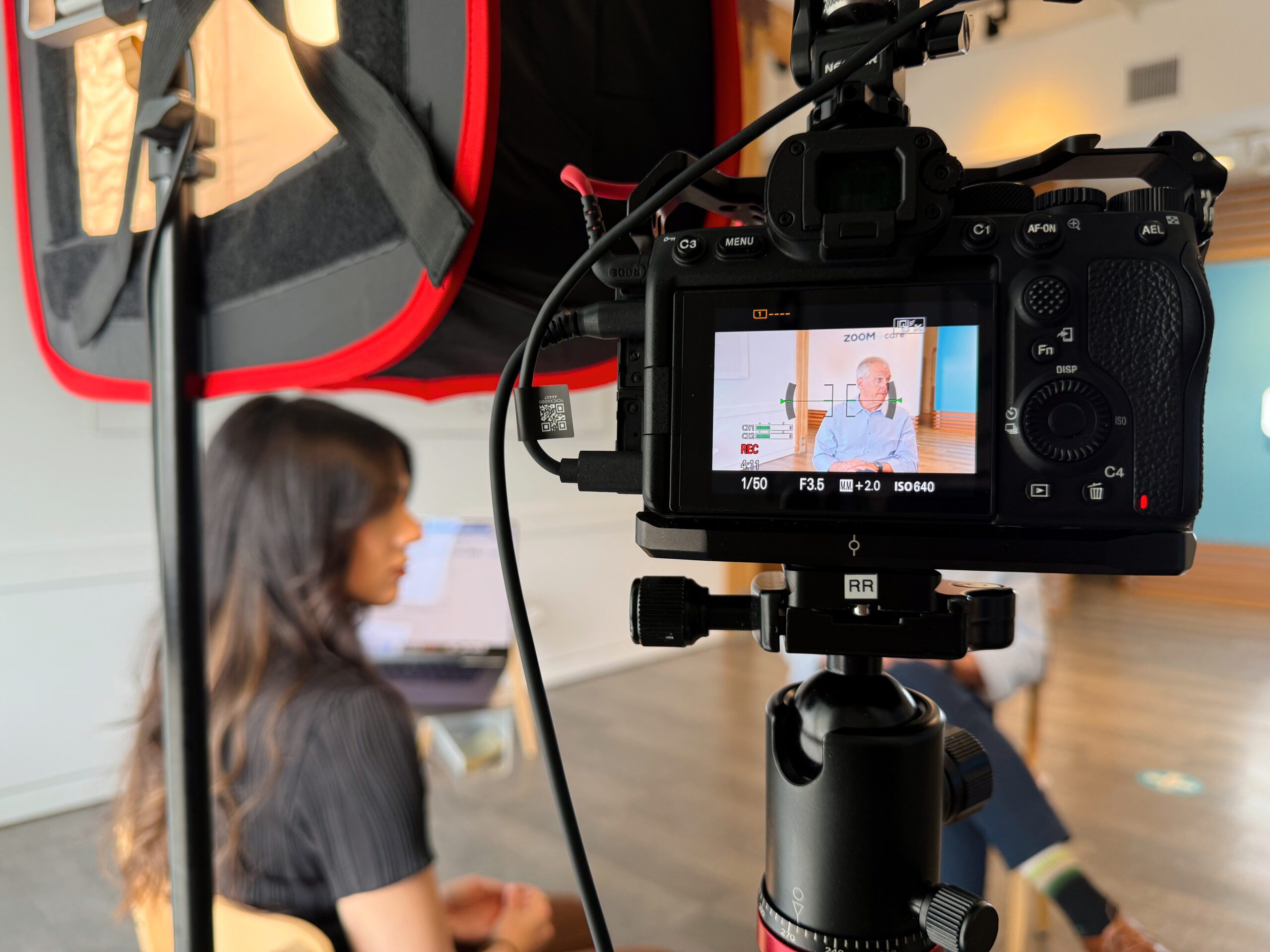 Recruit Rooster's Creative Services team interviewing employees on-site for client testimonial videos.